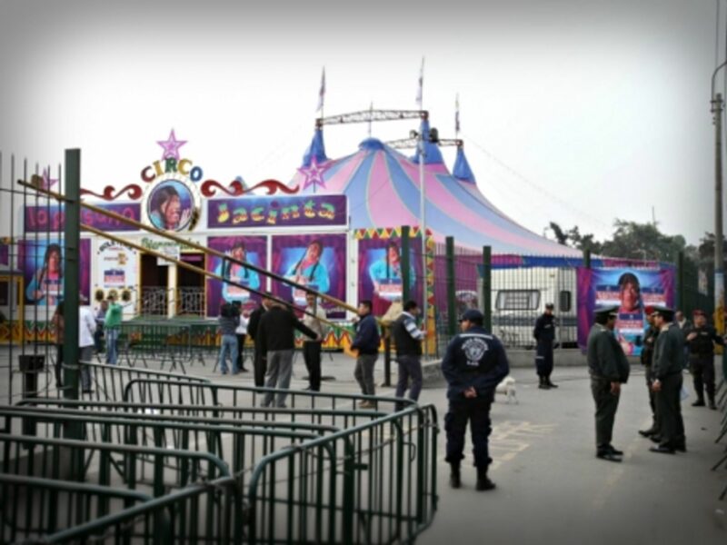 Policemen at work after the July 22 explosion in a Lima circus