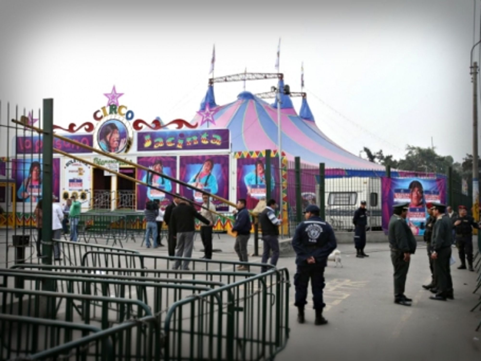 Policemen at work after the July 22 explosion in a Lima circus