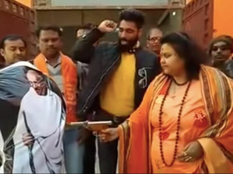 Pooja Shakun Pandey shoots an effigy of Gandhi