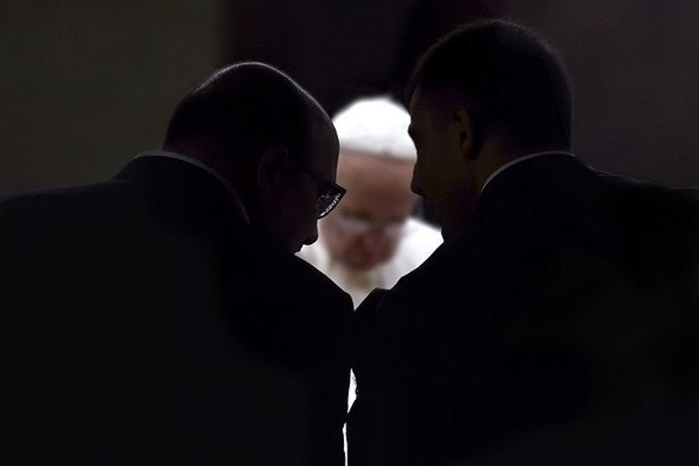 Pope Francis attending a vigil prayer.