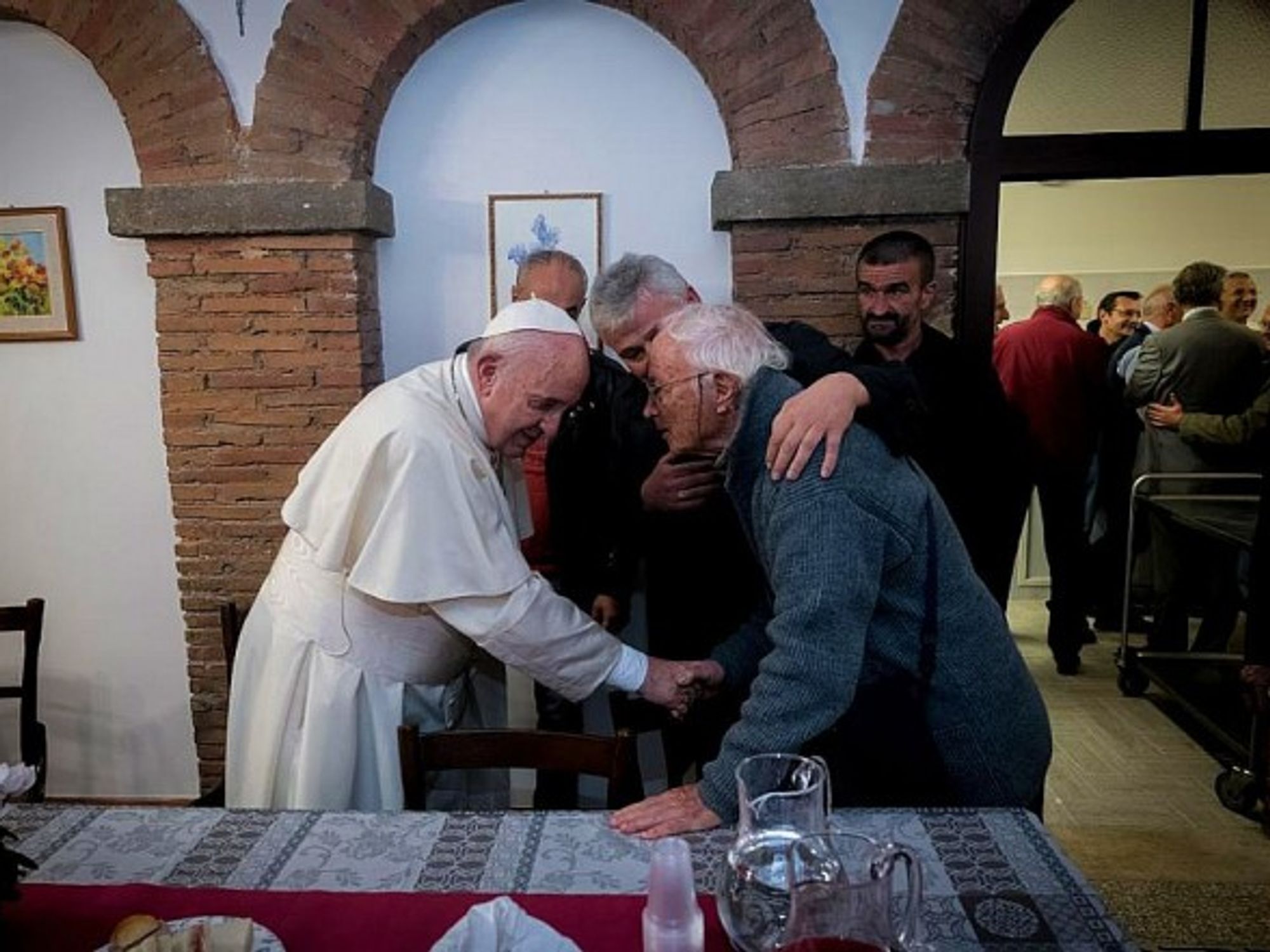 Pope Francis meets with the needy at Palazzo Migliori