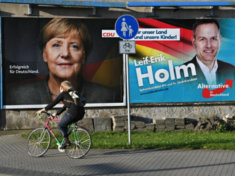 Poster for Merkel next to one for AfD in Stralsund, Germany