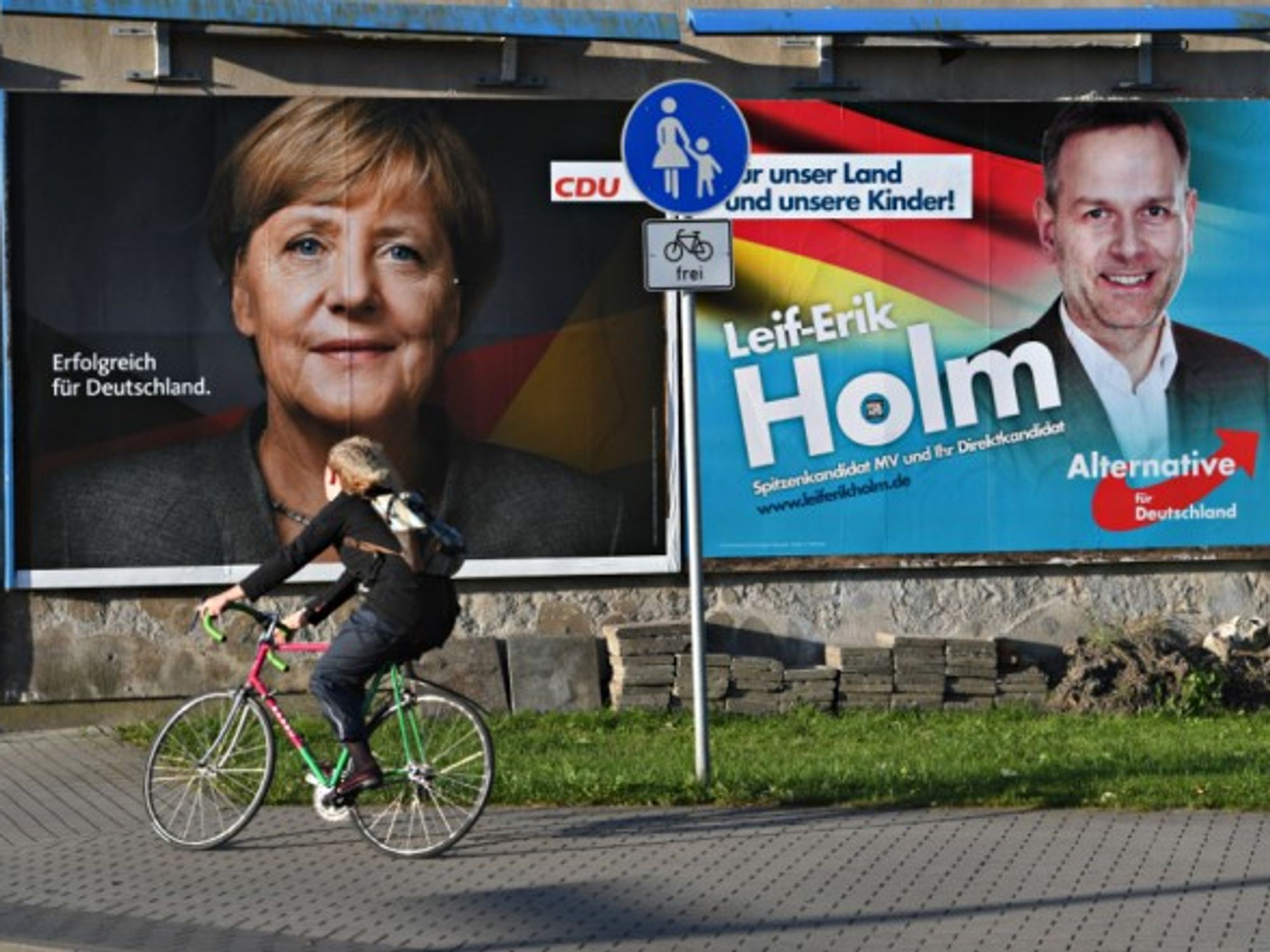 Poster for Merkel next to one for AfD in Stralsund, Germany