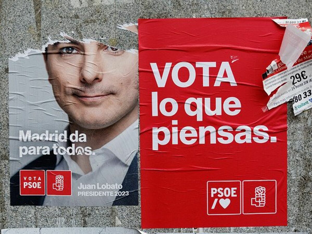 Poster of the PSOE ripped off on a wall in Madrid, Spain.
