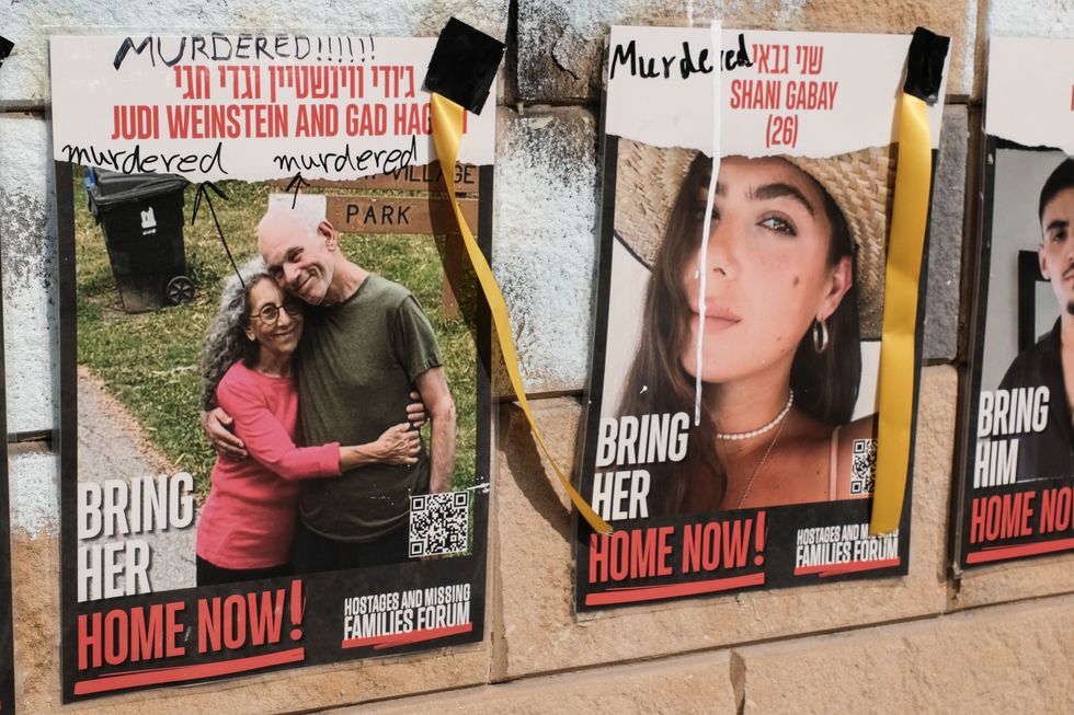 Posters depicting Israeli hostages still held by Hamas.