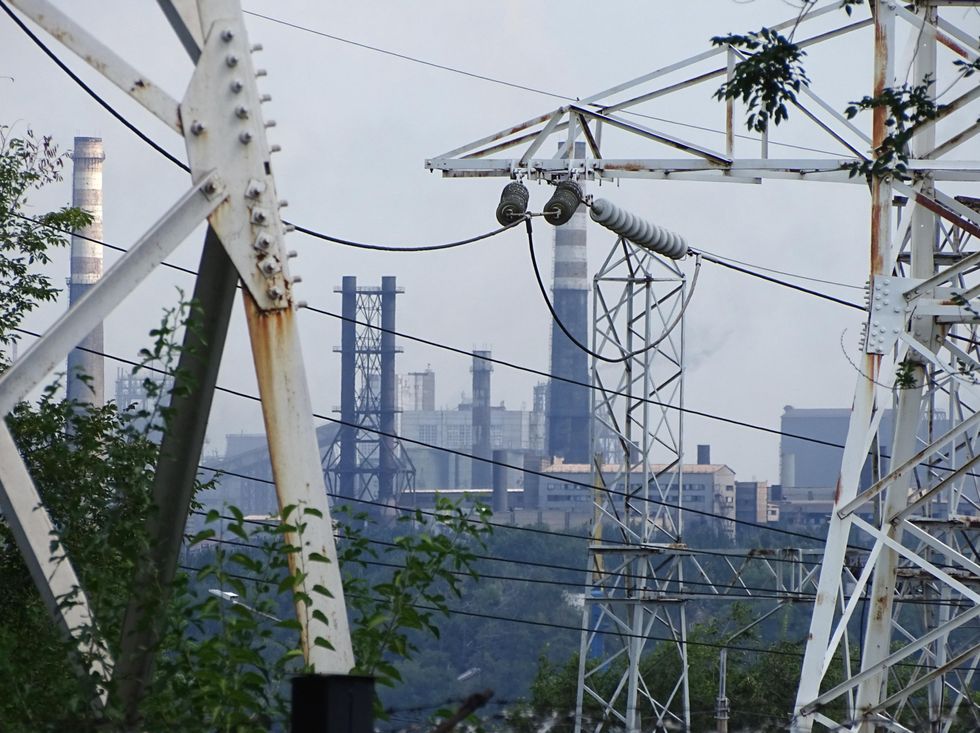 Power lines and factory chimneys in Dniprovsky District