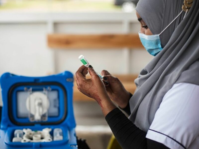 Preparing a vaccine dose in Nairobi, Kenya