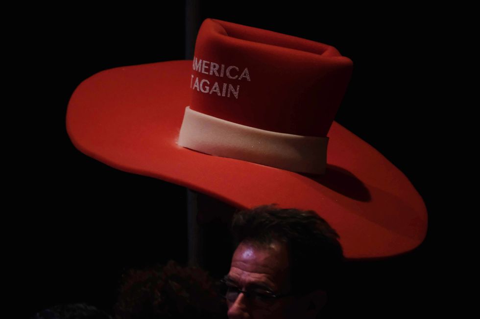 President Donald Trump holds a roundtable discussion with Latinos For Trump at the Arizona Grand Resort in Phoenix. The gathering was more of a campaign rally with very few people wearing masks or social distancing which is contrary to the Arizona's Covid rules against gathering indoors.