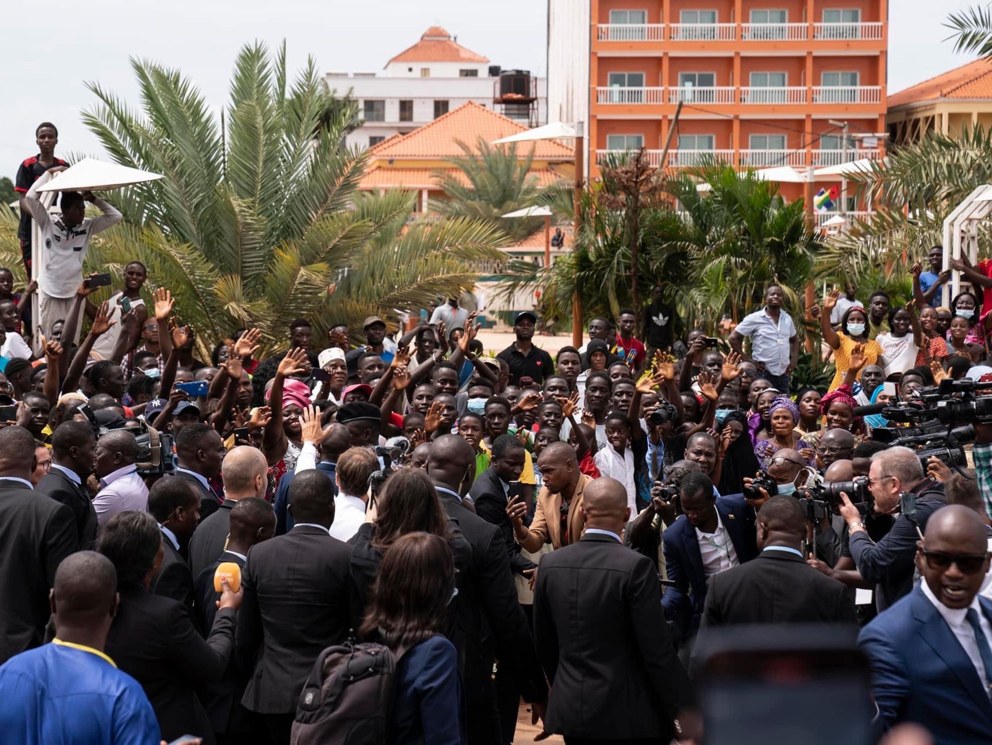 President Macron surronded by Bissau-Guineans during his visit on July 28, 2022