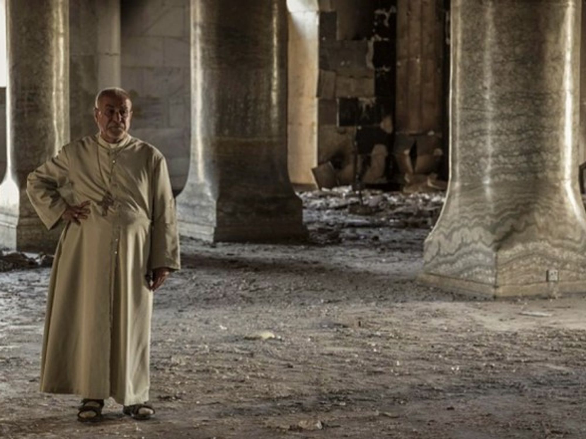 Priest of the ruined Immaculate Church in Al Hamdaniyah