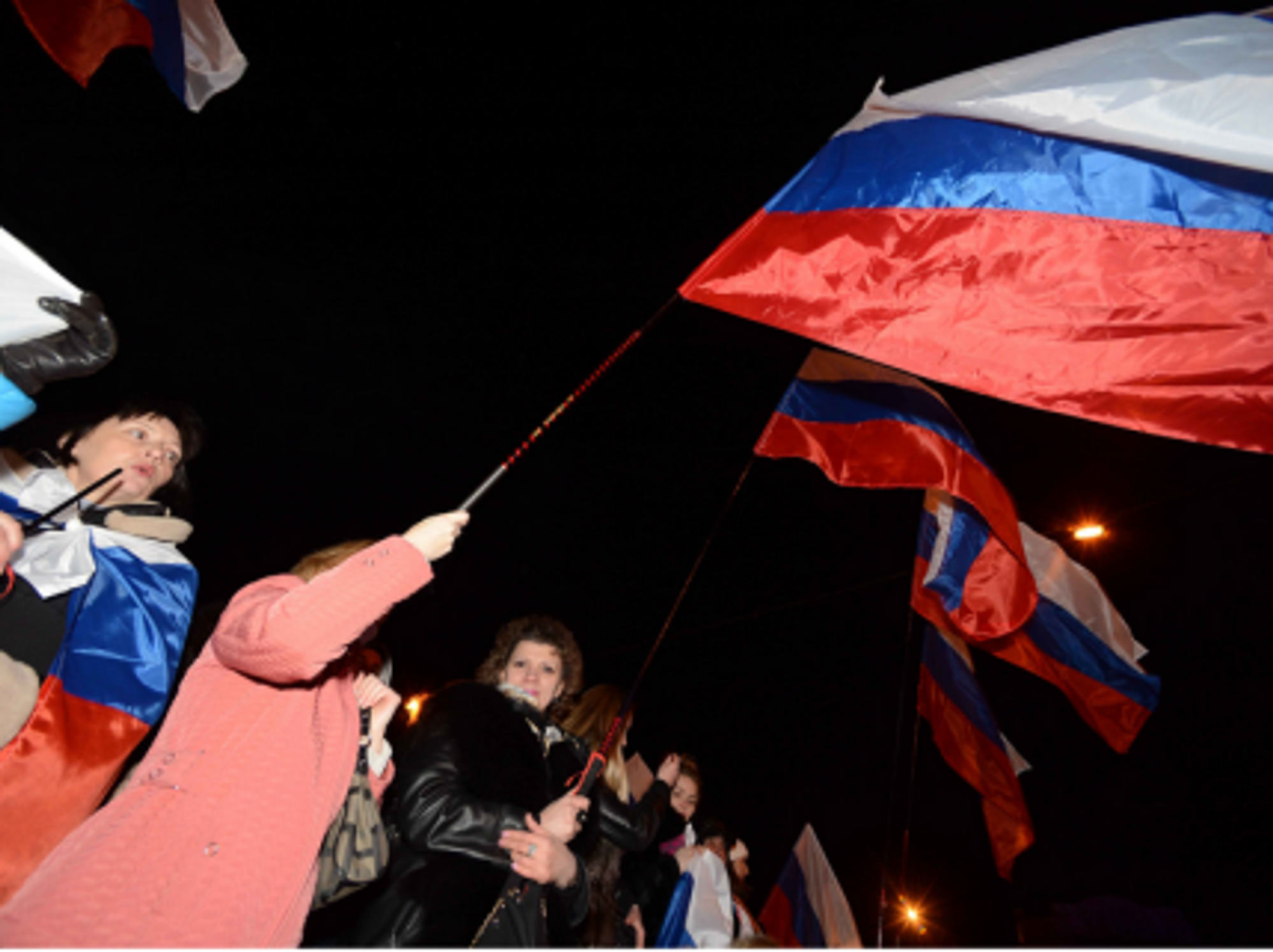Pro-Russia supporters celebrate the referendum Sunday