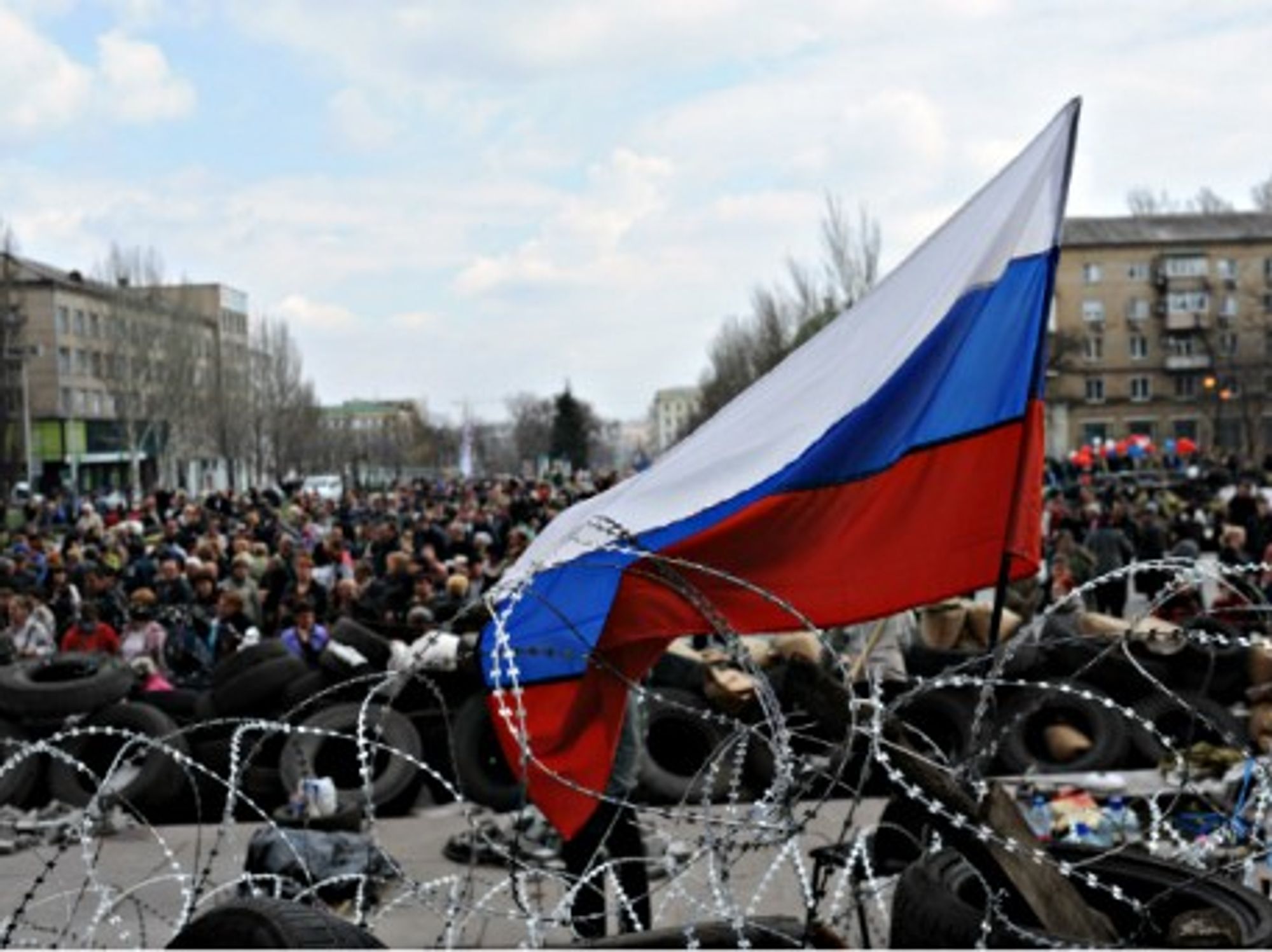 Pro-Russian activists gather in front of a government building in Donetsk on April 9.