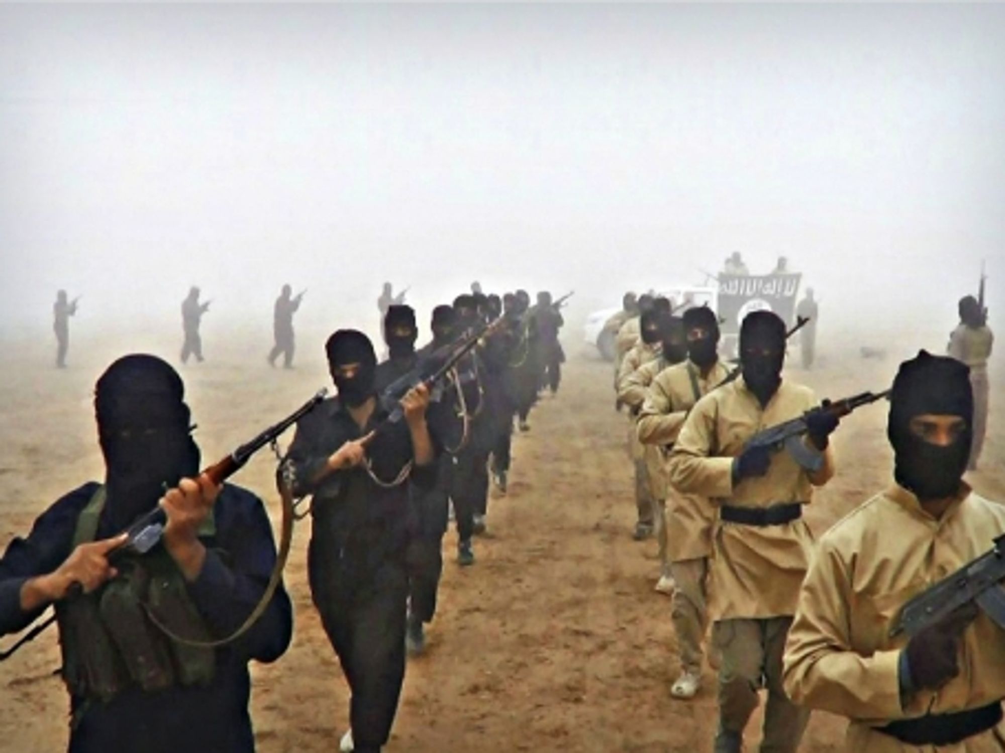 Propaganda photo released by militants showing ISIS fighters in Syria on Aug. 25