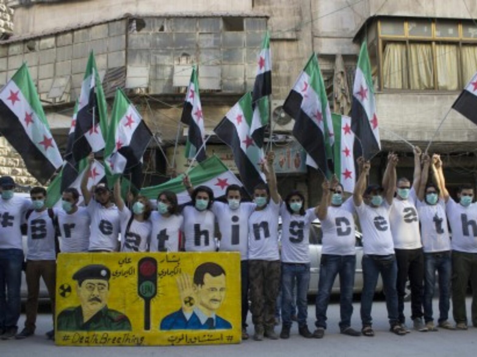 Protest in Aleppo on Aug. 21 to mark the one-year anniversary of the Ghouta massacre.