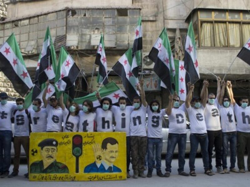Protest in Aleppo on Aug. 21 to mark the one-year anniversary of the Ghouta massacre.