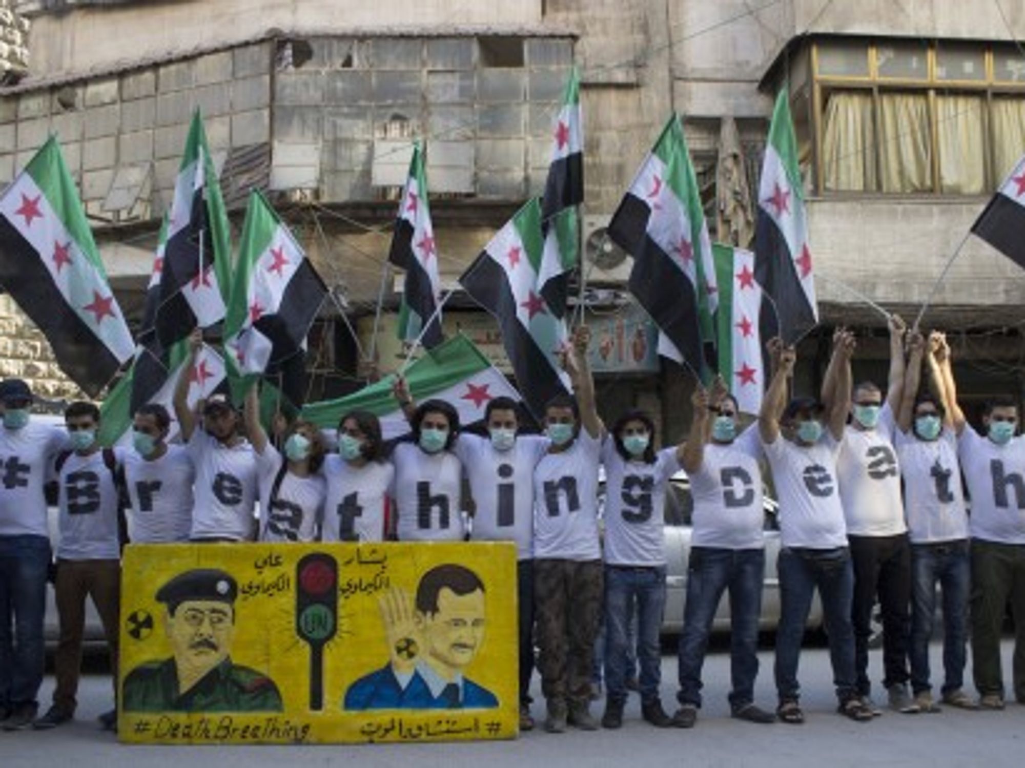 Protest in Aleppo on Aug. 21 to mark the one-year anniversary of the Ghouta massacre.