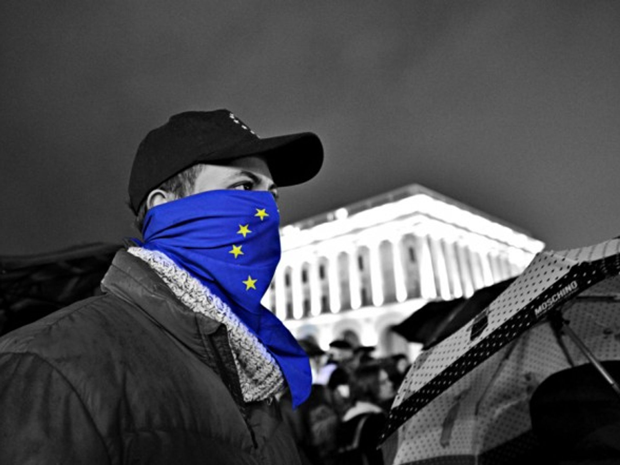 Protester wearing European flag as mask in Kiev, Ukraine
