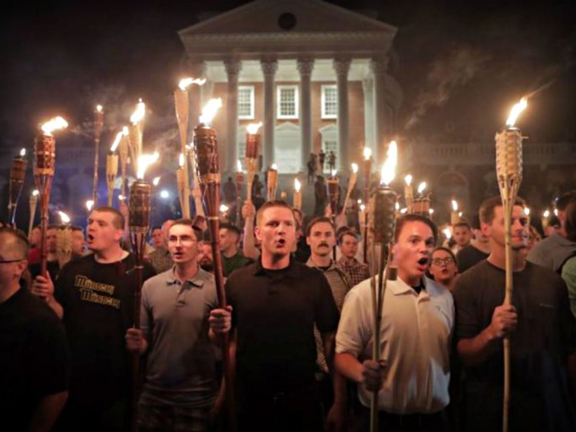 Protesters carrying Tiki torches in Charlottesville
