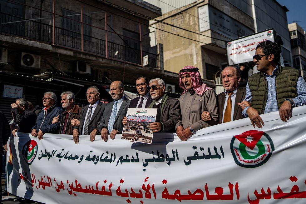 Protesters gathered in downtown Amman to oppose Israel's ongoing war on Gaza and Jordan's ties with Israel, in Amman, Jordan, on Dec. 6.