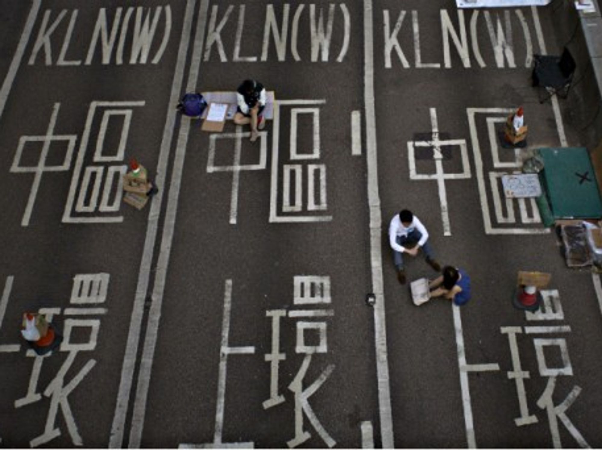 Protesters resting near Hong Kong's Central Government Office on Oct. 7.