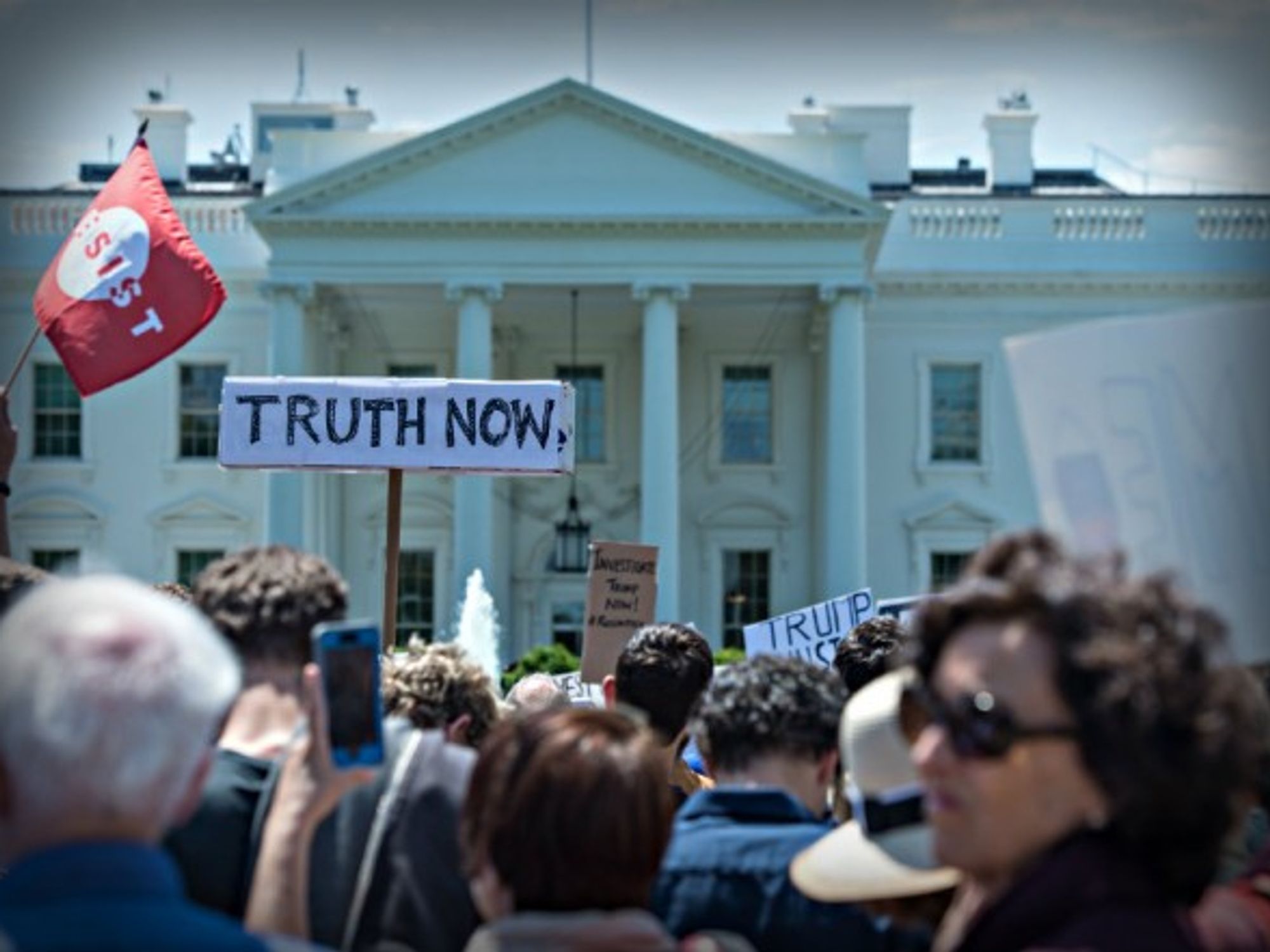 Protests outside White House after Comey's ouster.