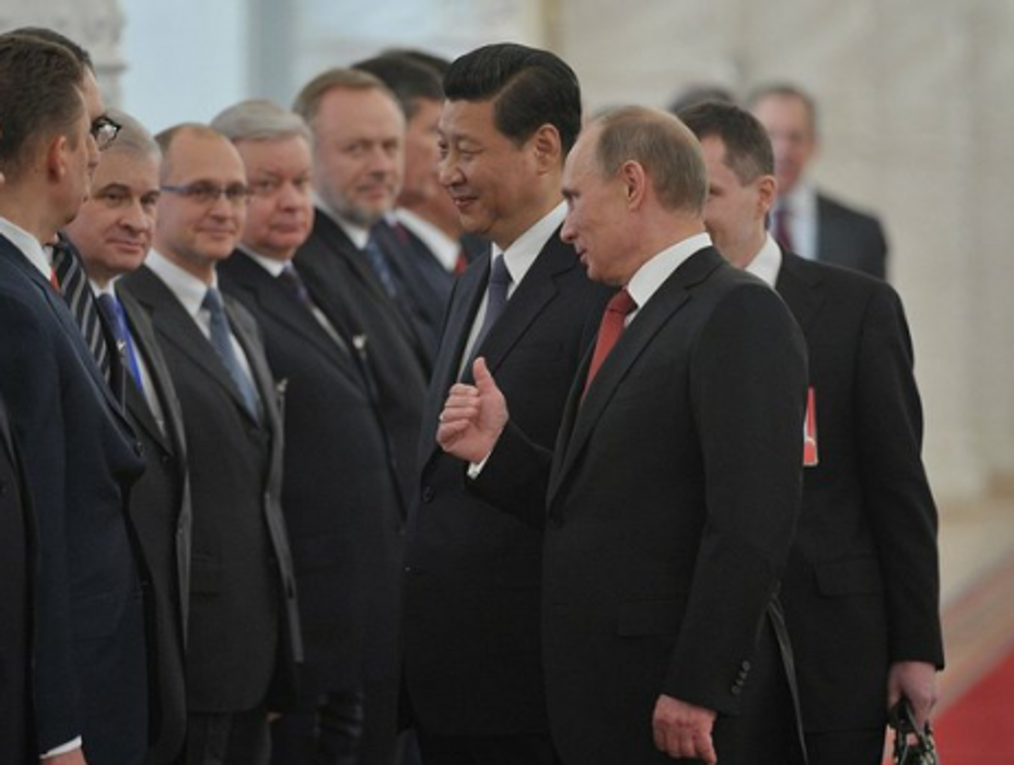 Putin and Xi Jinping at their meeting Friday.