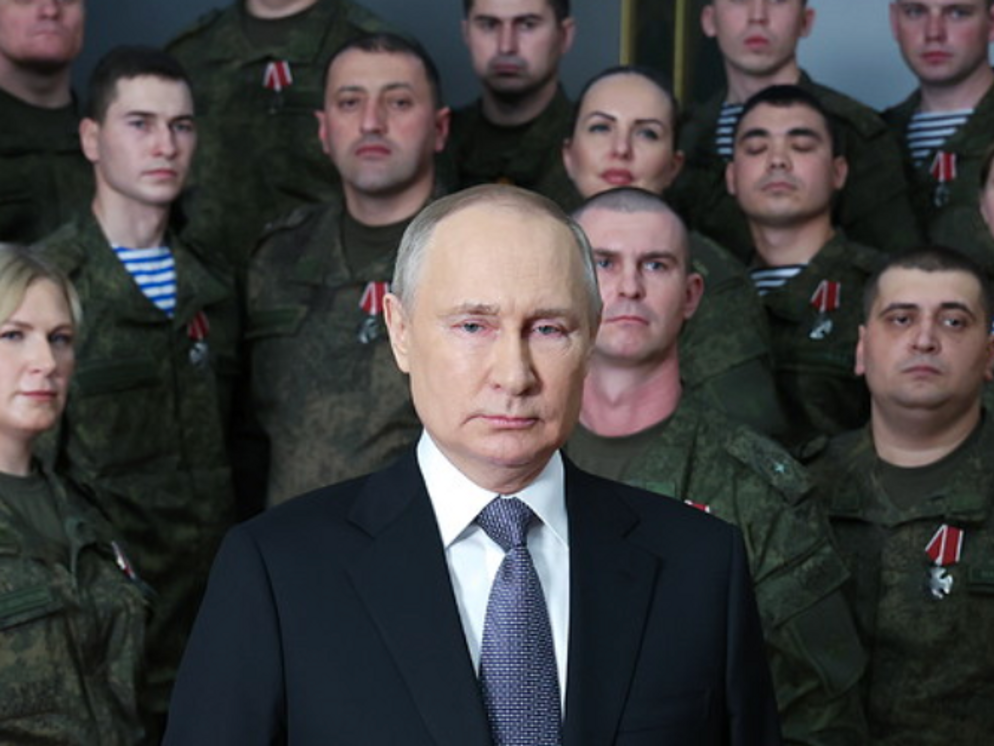 Putin posing in front of Russian soldiers