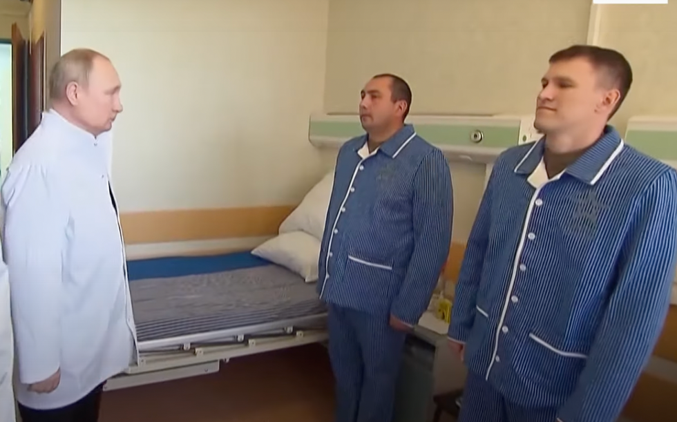 Putin visiting wounded soldiers from the "special operations" in Ukraine.