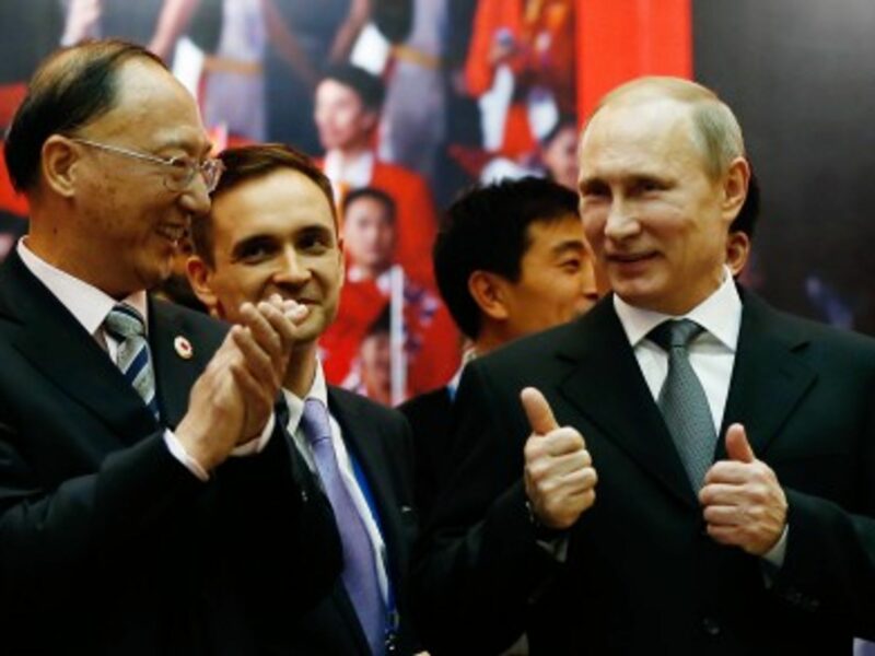 Putin with Liu Peng (front L), president of the Chinese Olympic Committee in Sochi in February