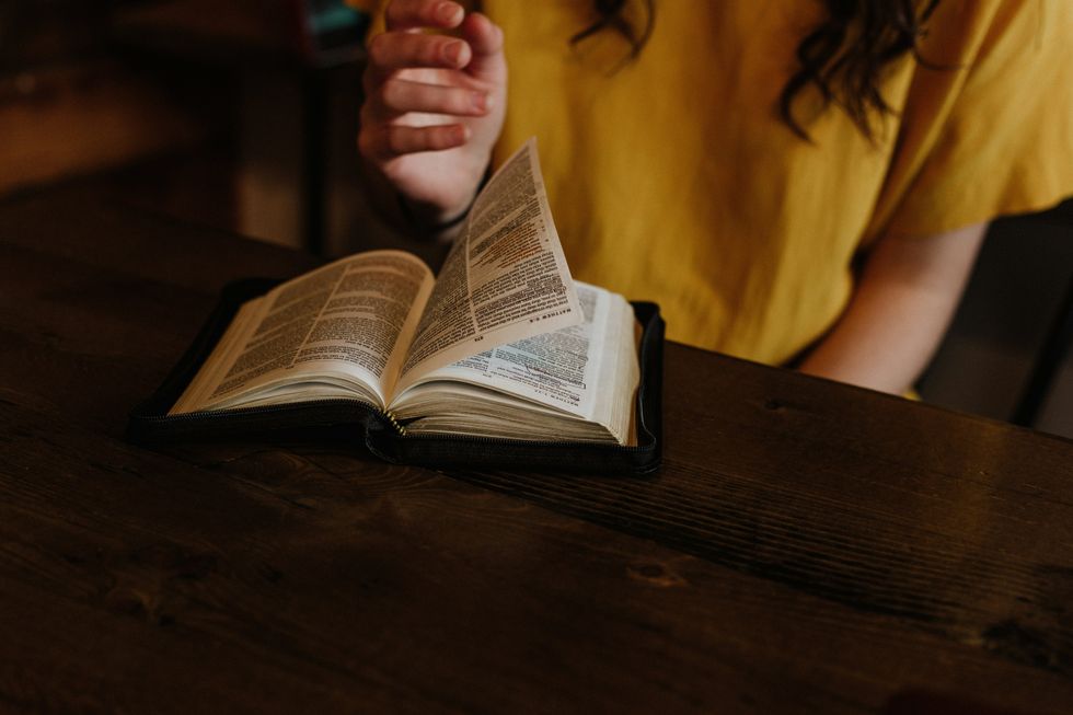 Reading the Bible.