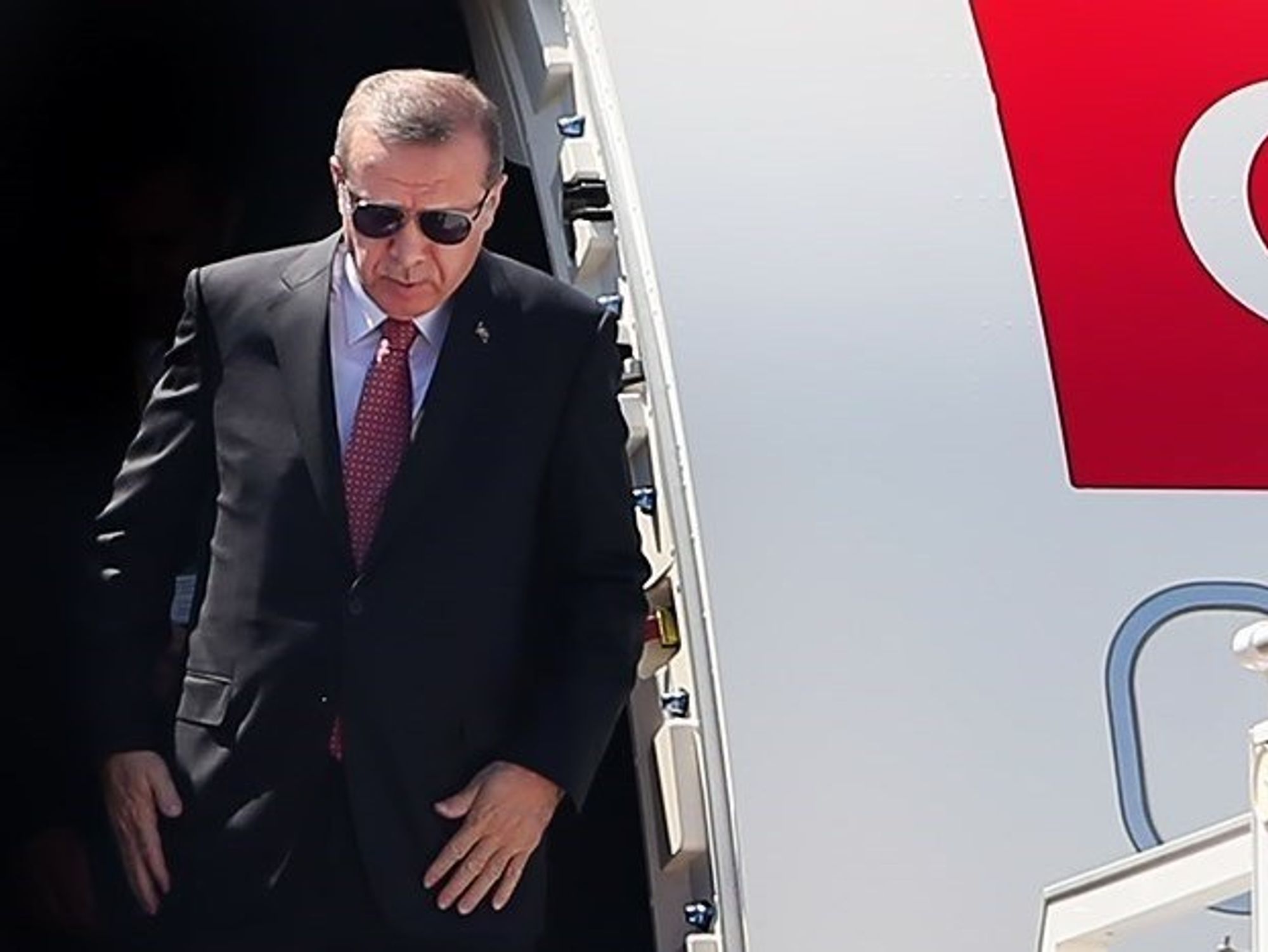 Recep Tayyip Erdogan getting off a plane.