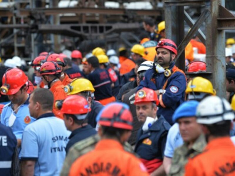 Recuers wait outside the entrance of the Soma mine on May 15.