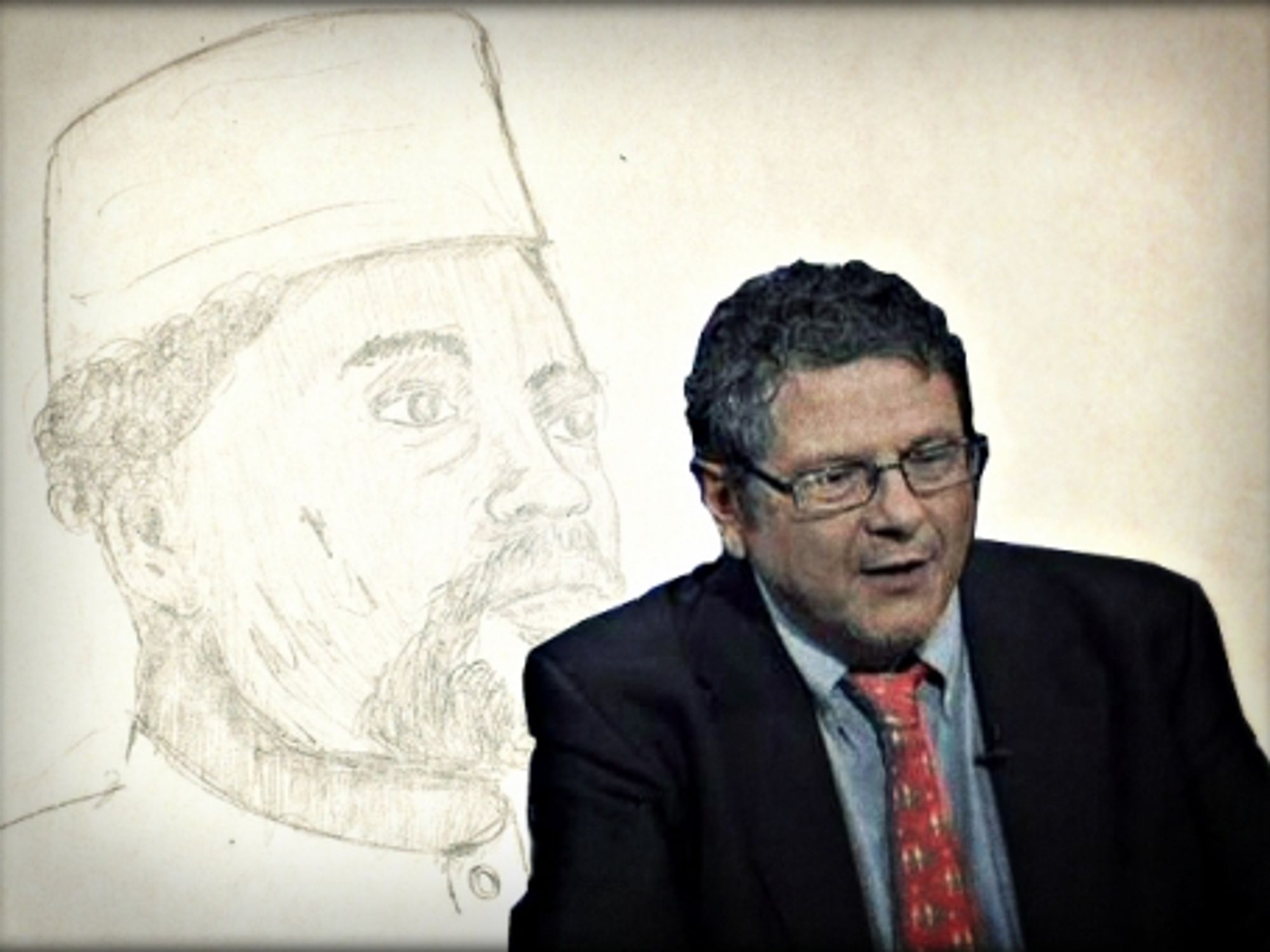 Reed Brody in front of a portrait of Hissene Habre