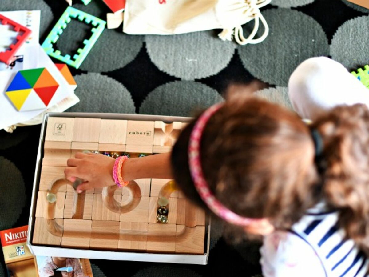Refugee girl playing in a Berlin school