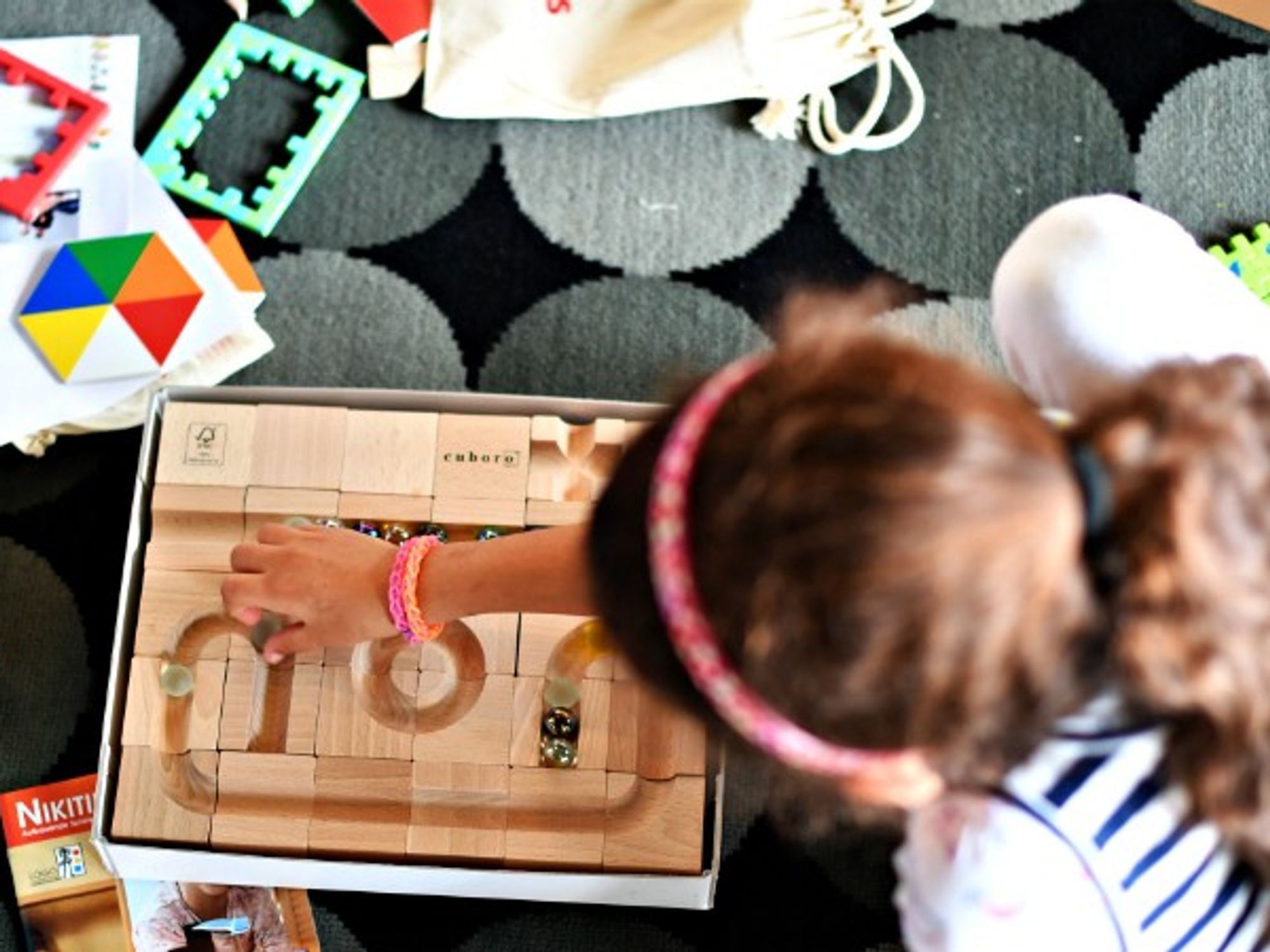 Refugee girl playing in a Berlin school