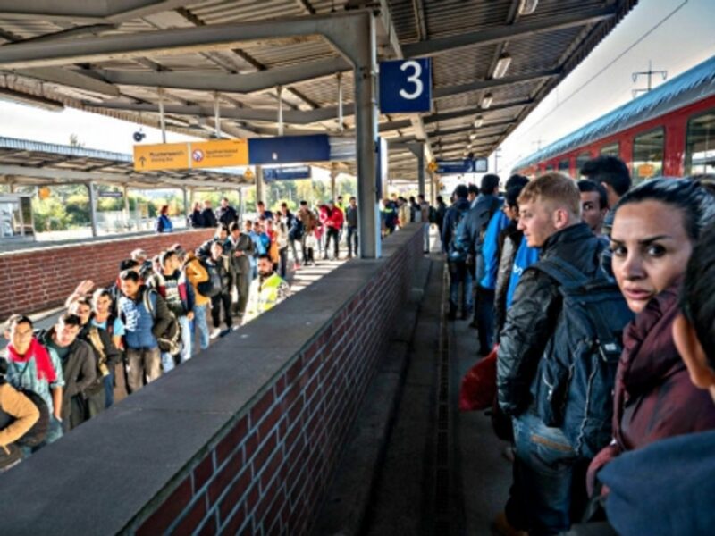 Refugees arriving in Berlin in October