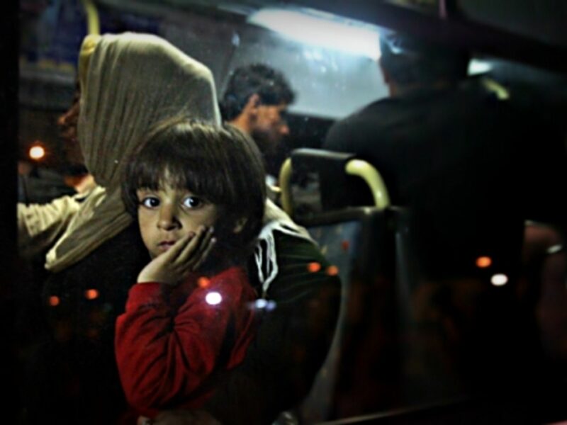 Refugees from Syria and Afghanistan arriving in Athens on Aug. 26
