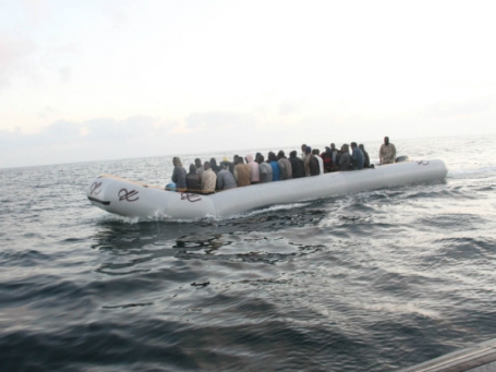 Refugees on a rubber boat