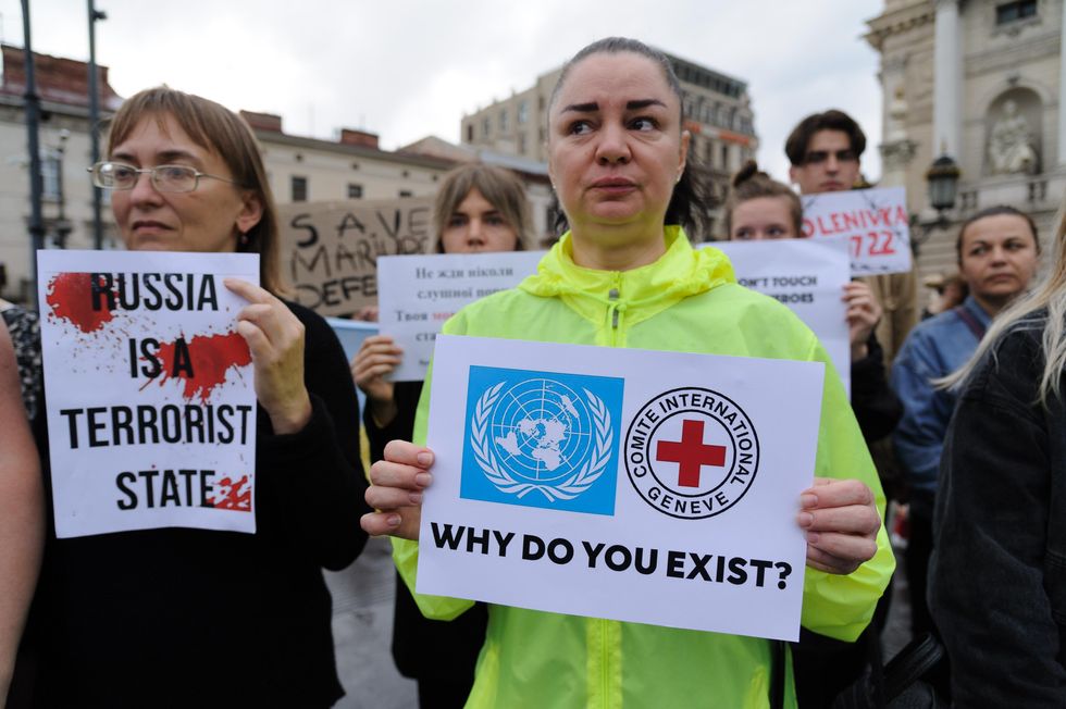Relatives and friends of the defenders of ''Azovstal'' hold placards expressing their opinions at a rally in Lviv