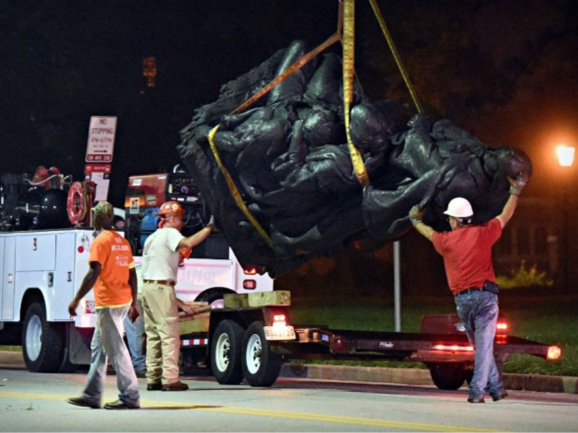 Removing statue in Baltimore on Aug. 16