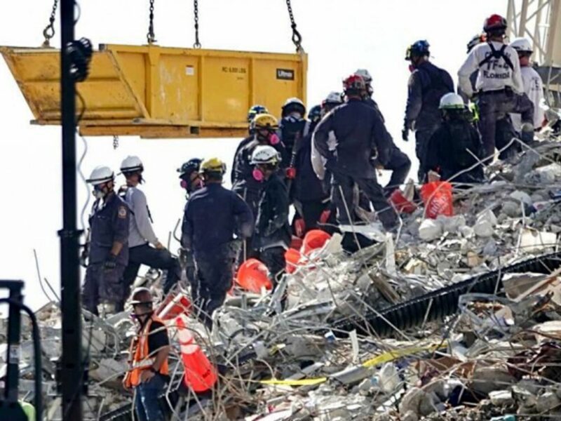 Rescue teams are still removing debris from the 12-story oceanfront residential building that collapsed last week in Surfside, near Miami, Florida. Ten people have been confirmed dead and at least 151 remain unaccounted for.