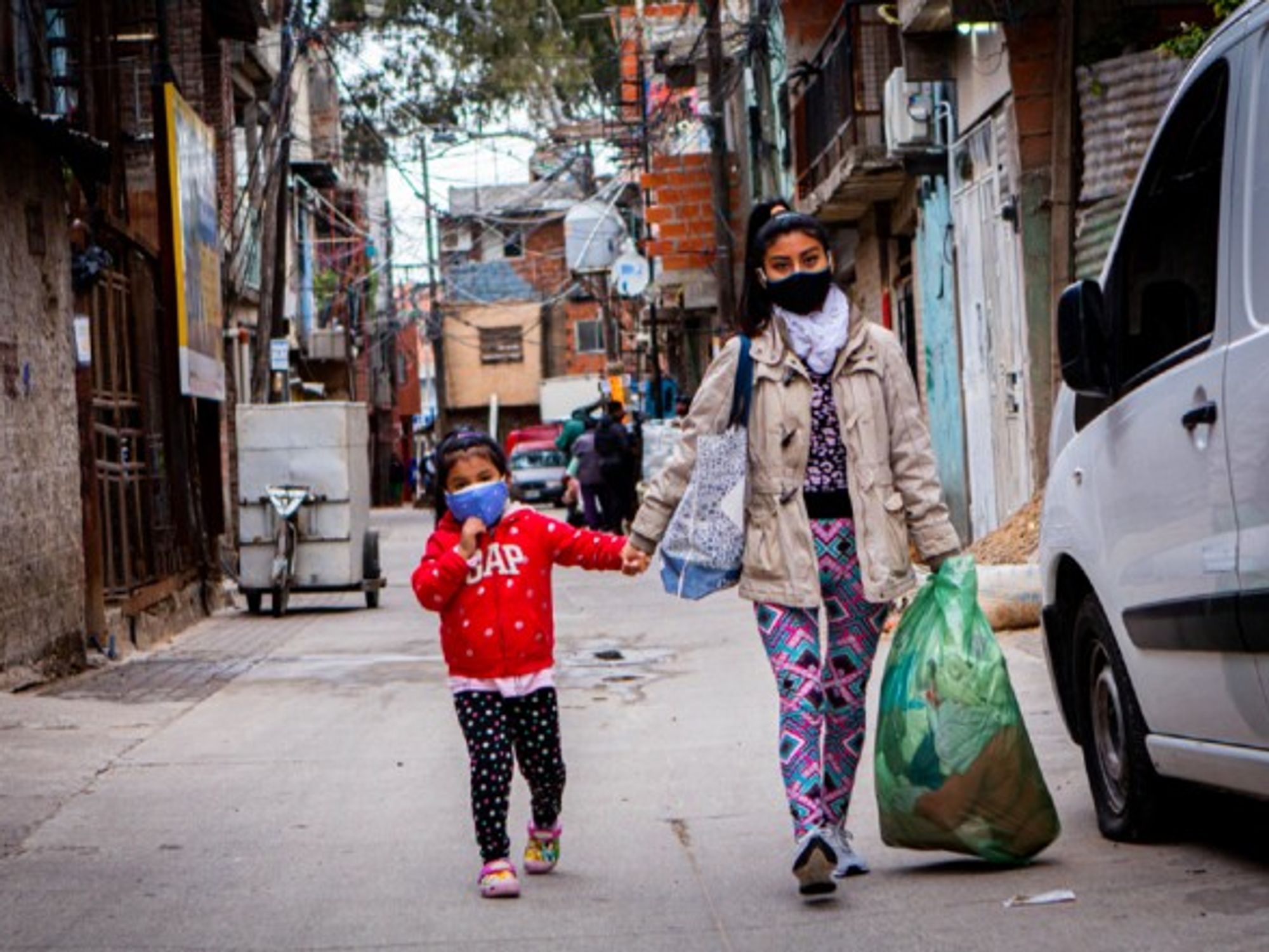 Residents walk through the streets in Buenos Aires, Argentina.