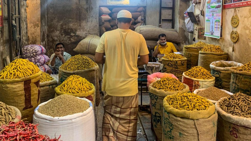Retailers selling spices at Shyambazar, Bangladhesh's biggest spice market.