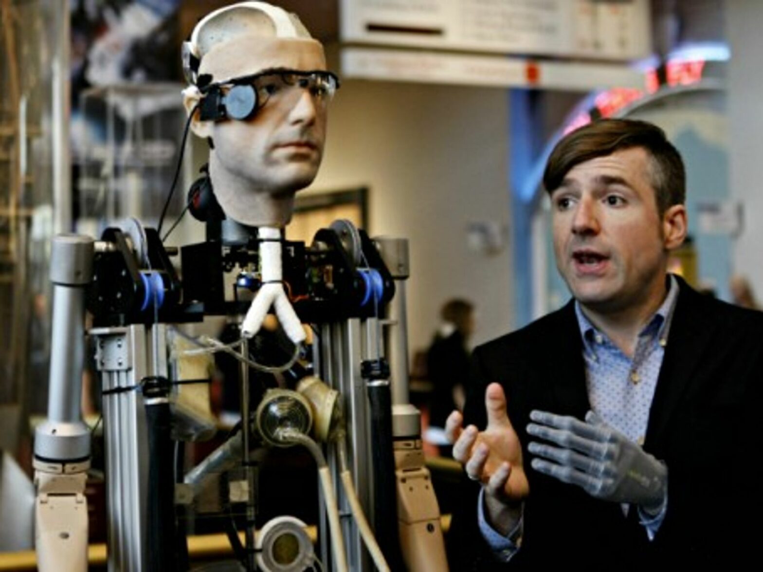 "Rex" and Bertolt Meyer, the man who lent his face to the bionic exoskeleton