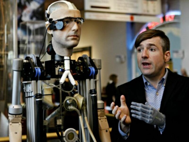 "Rex" and Bertolt Meyer, the man who lent his face to the bionic exoskeleton