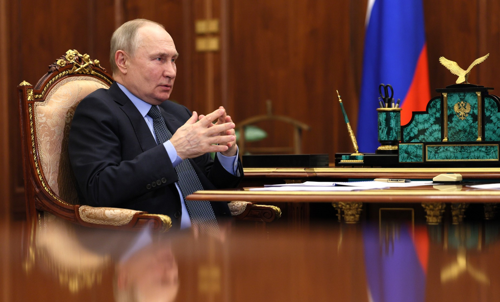 Russian President Vladimir Putin during a meeting with Rostelecom President Mikhail Oseyevsky at the Moscow Kremlin