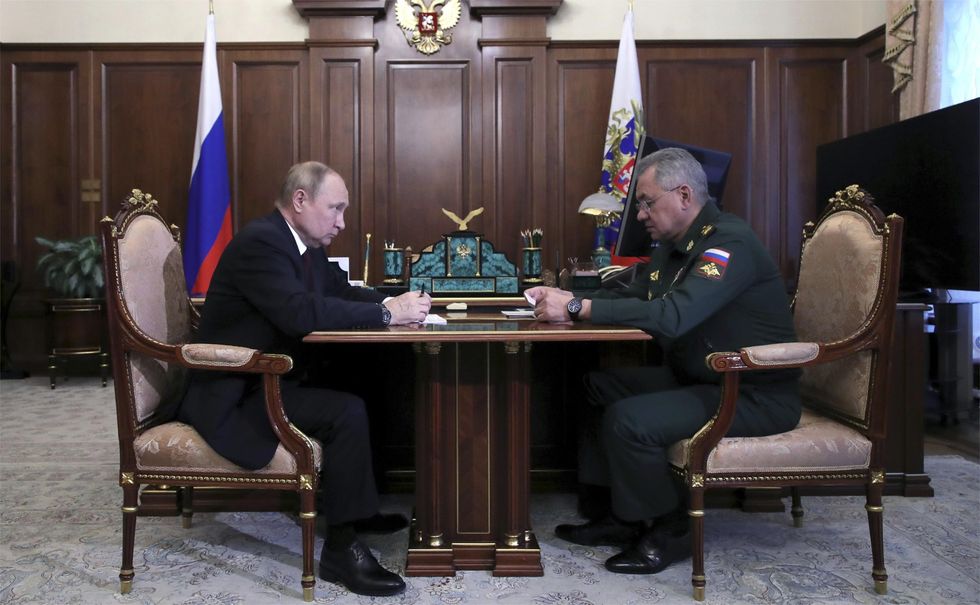 Russian President Vladimir Putin holds a face-to-face meeting with Defence Minister Sergei Shoigu following the capture of the key city of Lysychansk