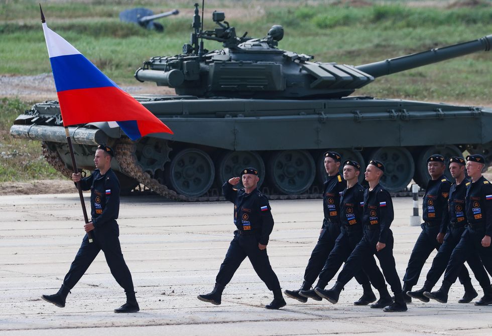 Russian servicemen march during the opening of the 2022 International Army Games at the Patriot military park.