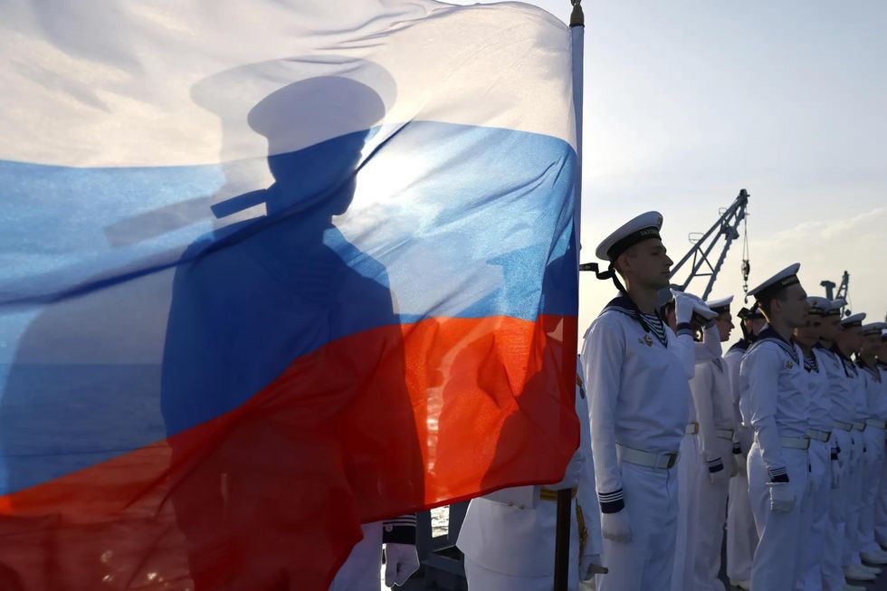 Russian soldiers at a ceremony to commemorate victims of World War II held on Gulf of Finland