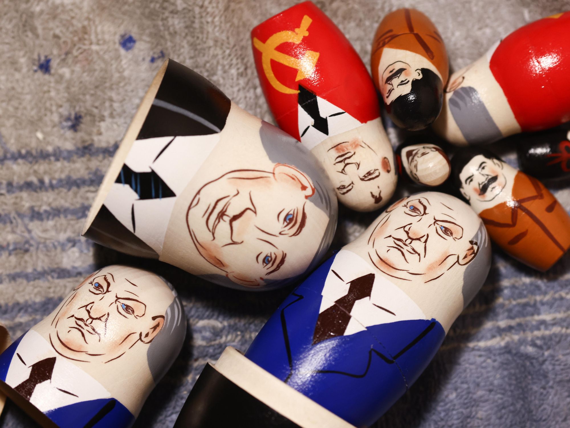 Russian traditional matryoshka nesting dolls depicting first Chairman of the Council of People's Commissars of the Soviet Union Vladimir Lenin, General Secretary of the Communist Party of the Soviet Union Joseph Stalin, first President of USSR Mikhail Gorbachev, and first President of Russia Boris Yeltsin, and Russian President Vladimir Putin